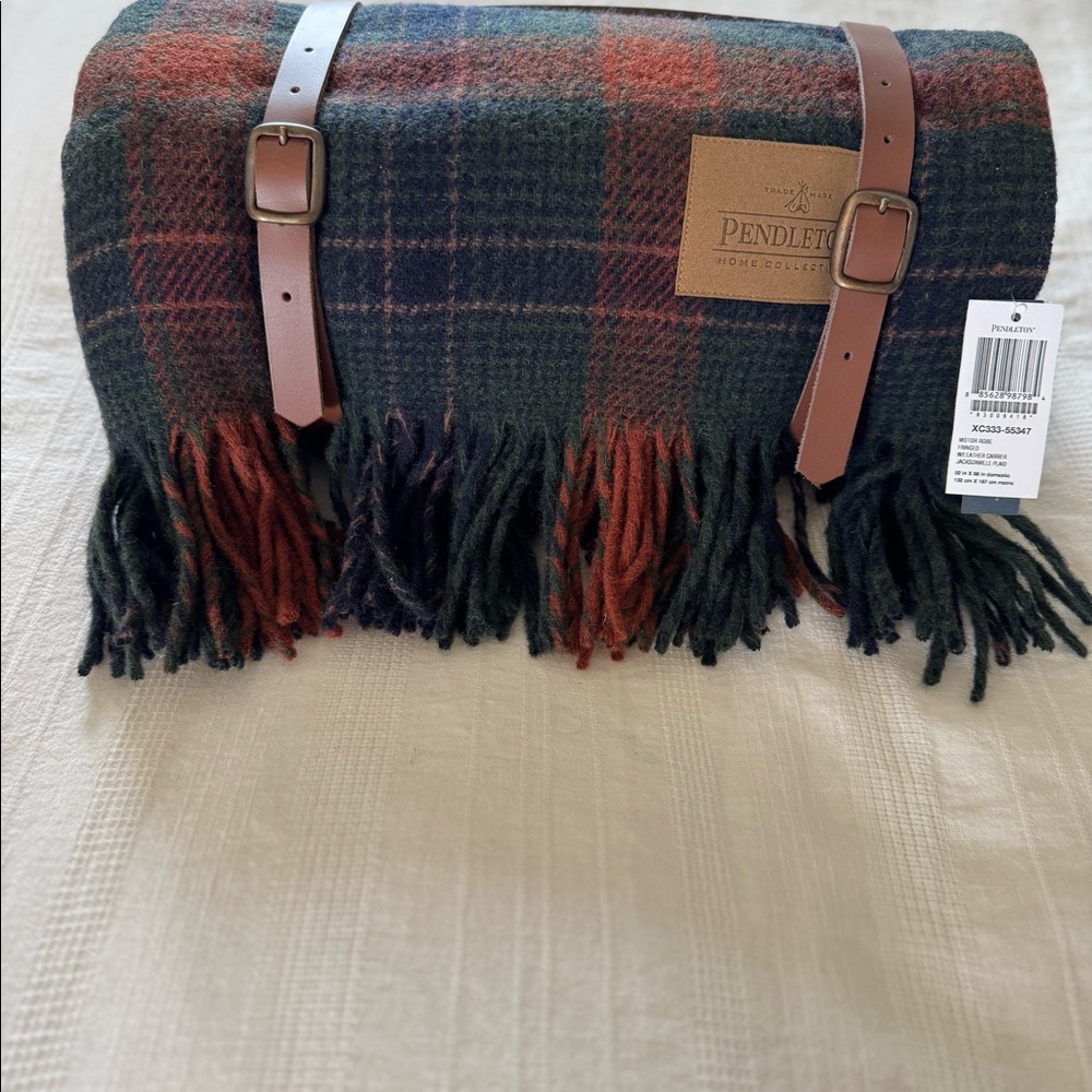 Pendleton Motor Robe wool throw with leather carrier.